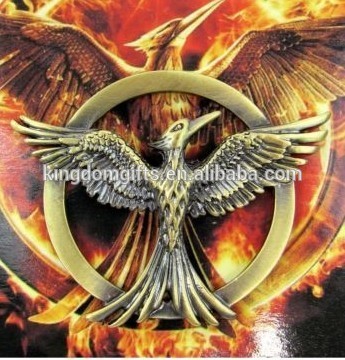 Hunger Games 3 lapel pin, antique hunger games badge